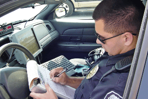 police officer writing a ticket