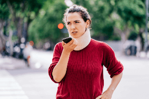 injured woman talking on the phone