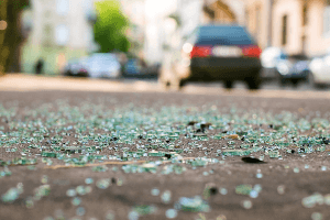 Broken glass on the road from a car accident.