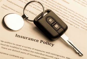 auto insurance policy and car key