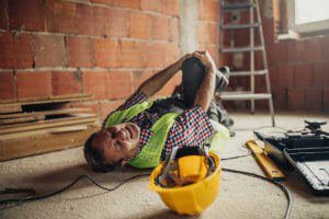 construction-guy-fell-from-ladder-holding-knee