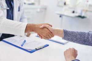 doctor-medical-records-handshake