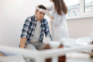 doctor wrapping up head